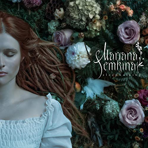 Red-haired woman amidst flowers, album cover for "Sleepwalking" by Mariana Semkina.