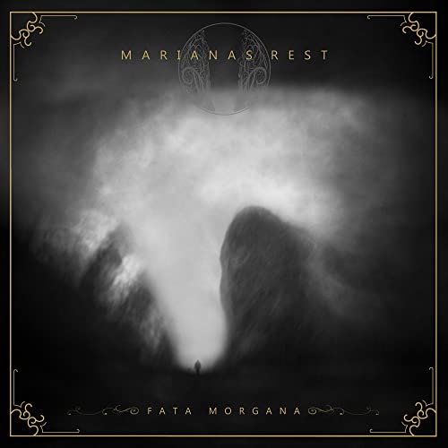 Dark, atmospheric album cover with a lone figure and swirling mist.