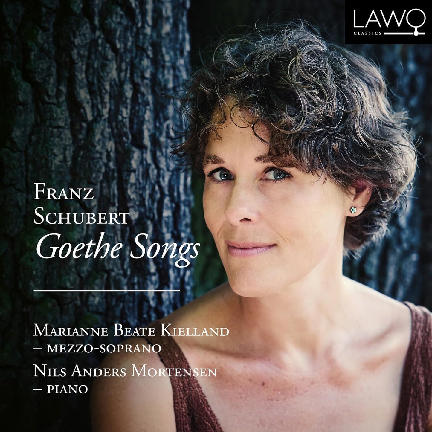 CD cover featuring Marianne Beate Kielland, a mezzo-soprano, with tree bark background.