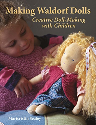 A young girl smiles while holding a handmade Waldorf doll with blonde curly hair.
