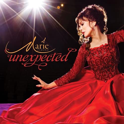 Marie Osmond in a red gown on the album cover "Unexpected".
