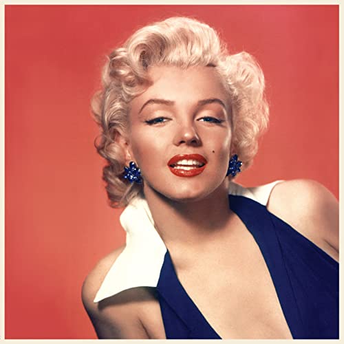 Close-up portrait of Marilyn Monroe with blonde curls, red lips, and blue earrings.
