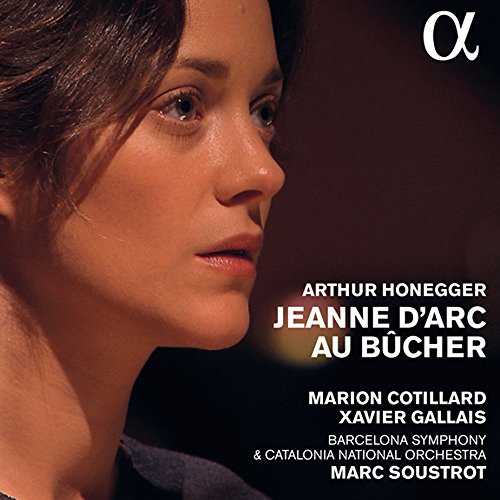 "CD cover featuring a close-up of a woman's face with white text overlay."
