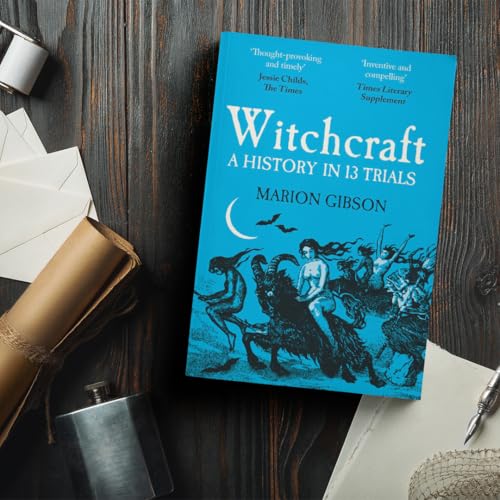 Book cover titled Witchcraft: A History in 13 Trials by Marion Gibson on wood surface.