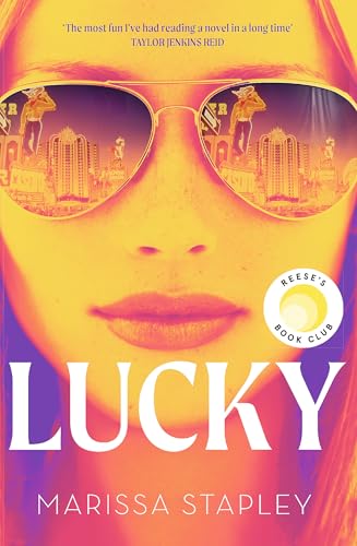 Book cover for "Lucky" featuring a woman with sunglasses reflecting a city.