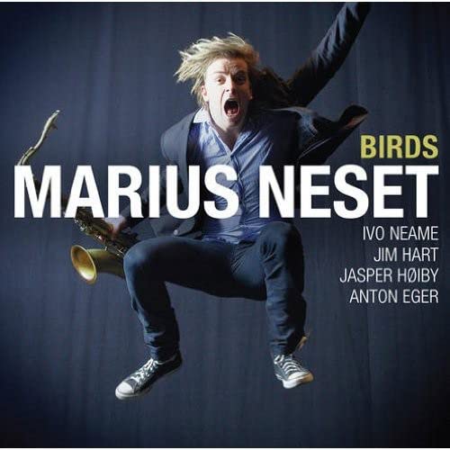 Album cover for Marius Neset’s “Birds” featuring a saxophonist in motion.