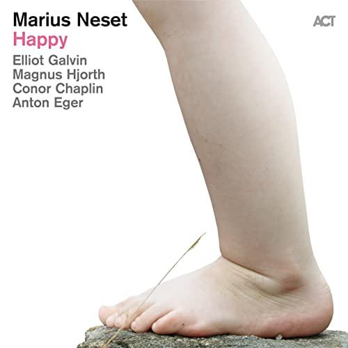 Album cover for Marius Neset’s “Happy” featuring a bare foot and leg.
