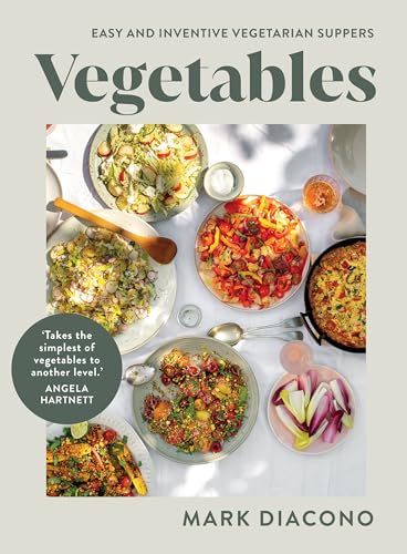 Cookbook cover featuring colorful vegetarian dishes arranged on a white surface.