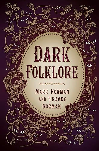 Book cover: “Dark Folklore” with floral designs and skull motifs.