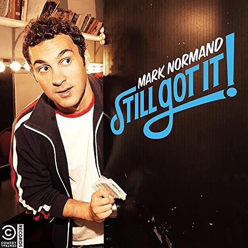 CD cover featuring comedian Mark Normand in a jacket, with bold text.