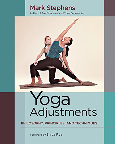 Book cover featuring two women demonstrating a yoga pose.