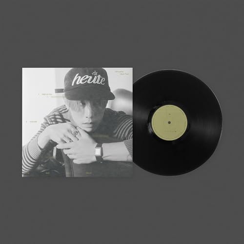 Mark Tuan vinyl record with album cover featuring a man in a hat.
