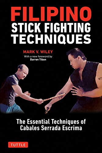 Book cover depicting two men practicing Filipino stick fighting with rattan sticks.