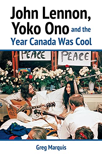 Book cover featuring John Lennon and Yoko Ono in bed with flowers.