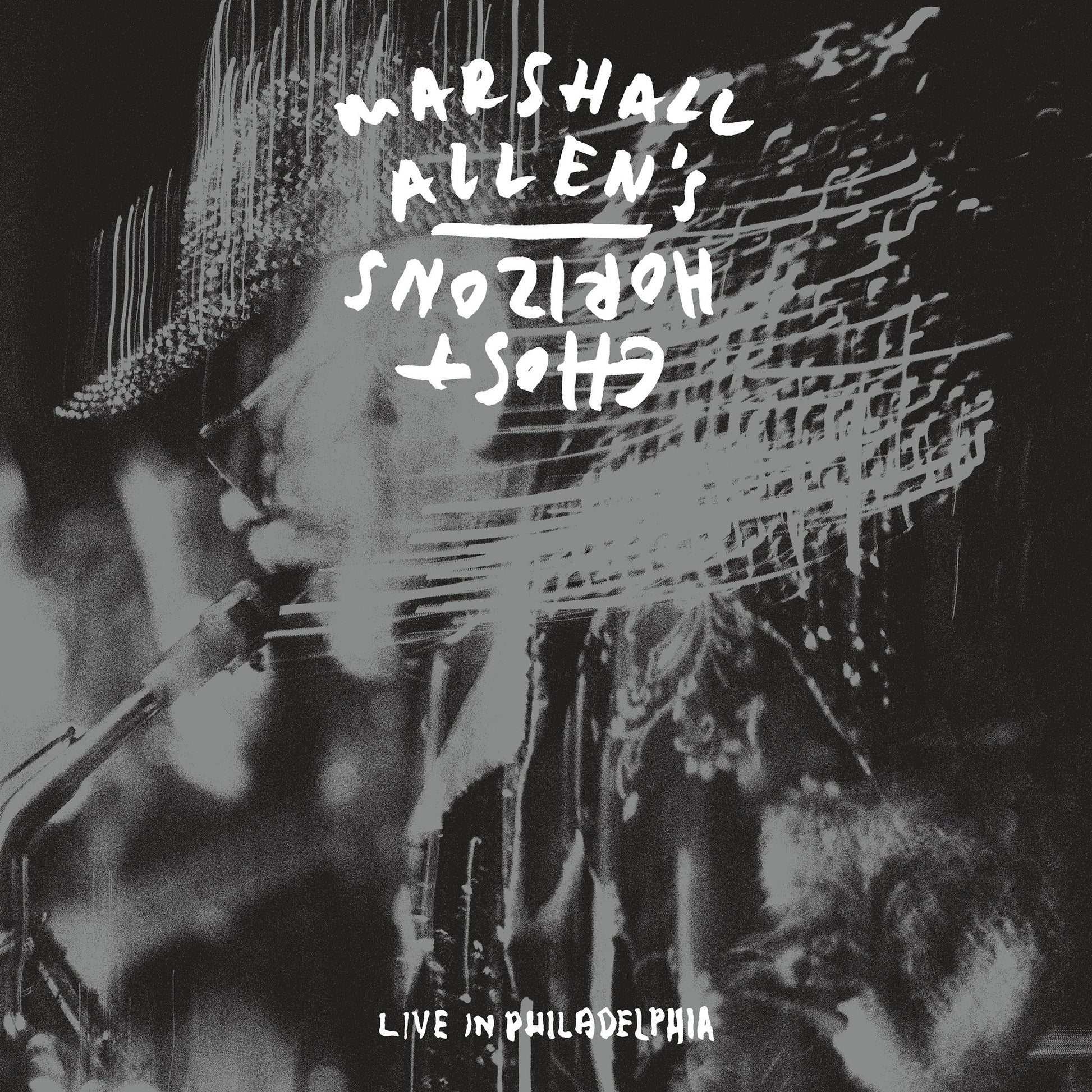 Black and white photo of a musician playing saxophone with overlaid hand-written text.