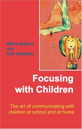 Book cover: "Focusing with Children" with childlike drawing of figures.