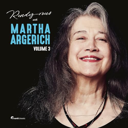 Close-up portrait of pianist Martha Argerich with silver and dark hair.