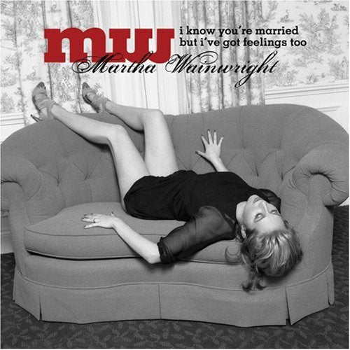 Black and white album cover showing a woman reclining on a tufted sofa.