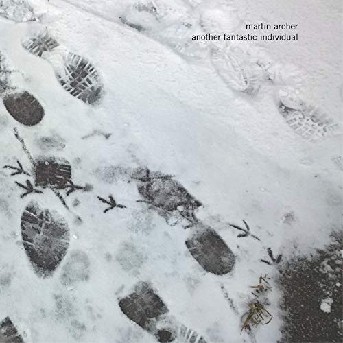 CD cover: snow with footprints and small twigs, text at top.