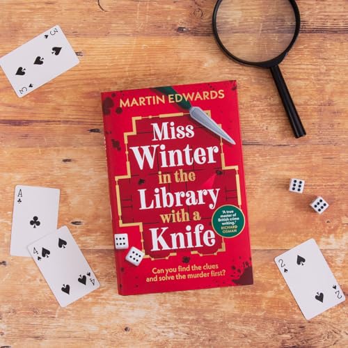 Red book cover with title, knife, playing cards, and magnifying glass.