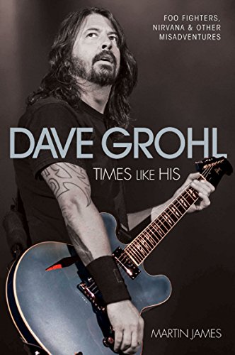 Dave Grohl holding a guitar on the cover of his autobiography.