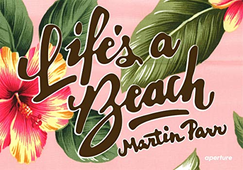 Book cover with tropical leaves, flowers, and text "Life's a Beach" by Martin Parr.