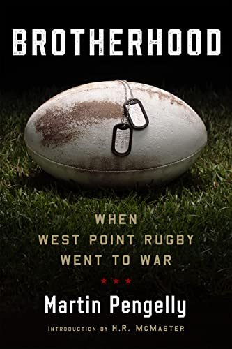 Book cover: Rugby ball with dog tags on grass, title “Brotherhood.”