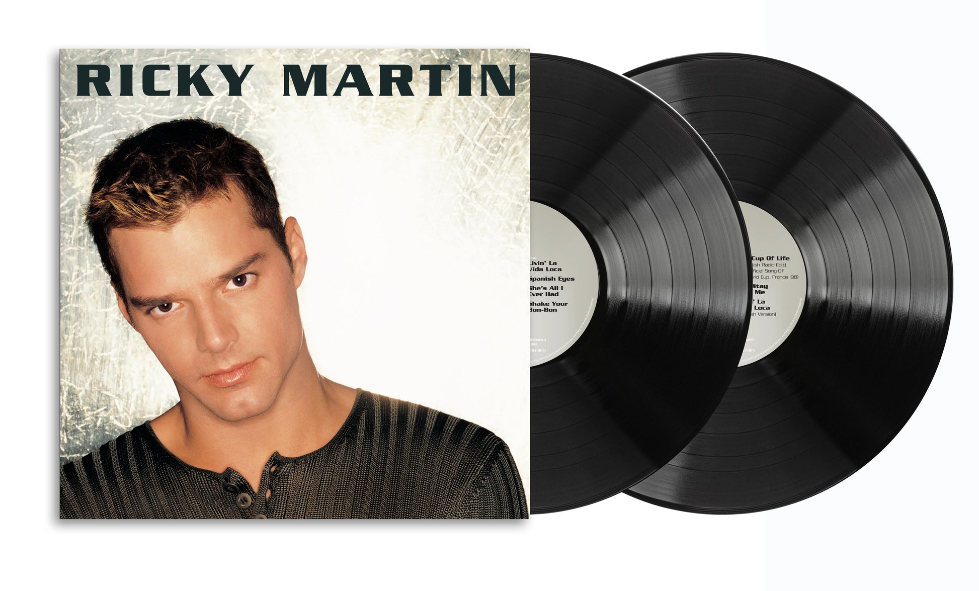 Ricky Martin album cover and a black vinyl record against white background.