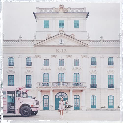 Melanie Martinez “K-12” album cover: pink schoolhouse and school bus.