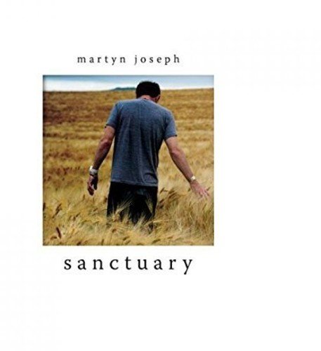 CD cover: man in wheat field, text “Martyn Joseph Sanctuary”.