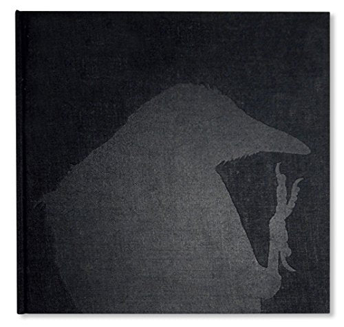 The image depicts a white and black book cover with the title "RAVENS" prominently displayed. The cover is divided into two sections: the left side is white, while the right side is black. The word "RAVENS" is centered on the white section in a simple, black font. The overall design is minimalist and clean, with a clear emphasis on the title. The image appears to be a product photo for an online retailer or catalog. Alt text: "A book cover with