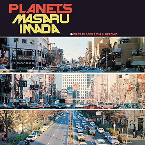 CD cover for “Planets” by Masaru Imada, showing a busy city street.