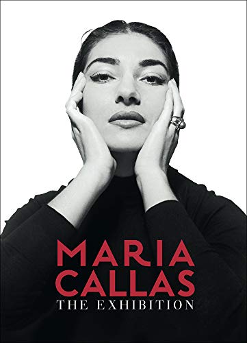 Black and white portrait of opera singer Maria Callas, hands framing face.
