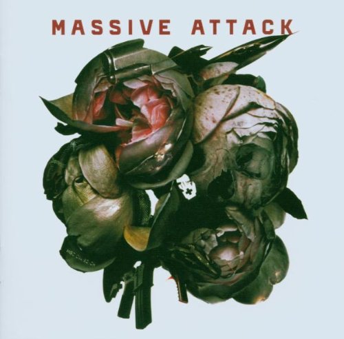 Massive Attack “Collected” CD cover: dark flowers against a pale blue background.