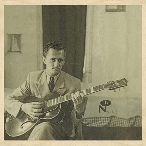Sepia-toned portrait of a man with a guitar, album art.