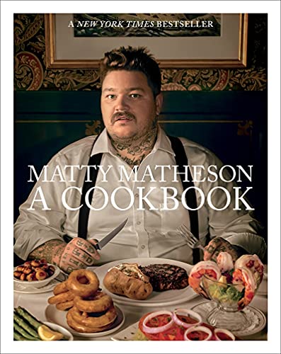 Cookbook cover featuring chef Matty Matheson with food and tattoos.