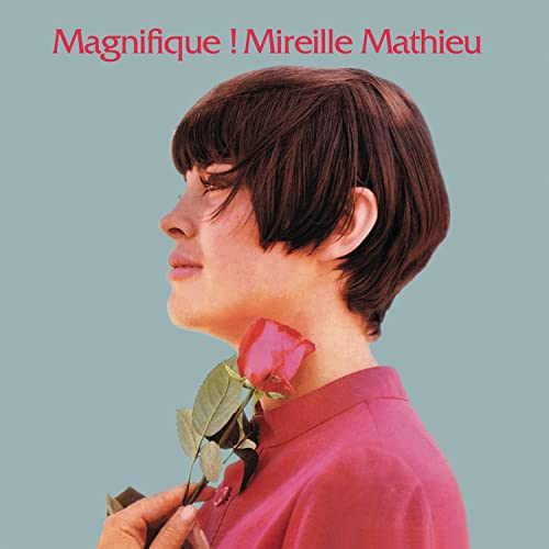 Mireille Mathieu album cover: portrait of a woman holding a red rose.