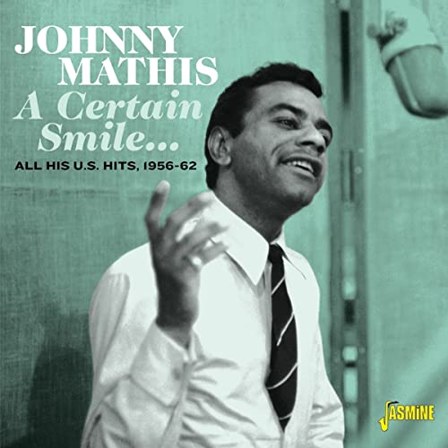Johnny Mathis album cover, "A Certain Smile...", featuring his portrait.