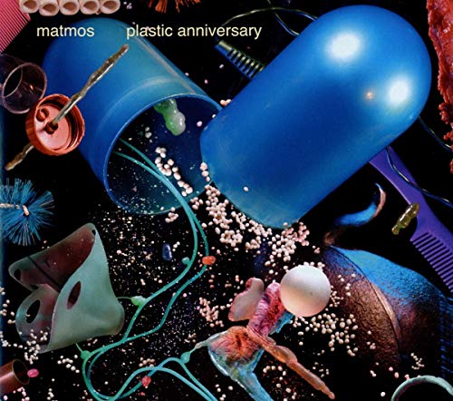 Album cover with assorted plastic items and text "matmos plastic anniversary" on a black background.