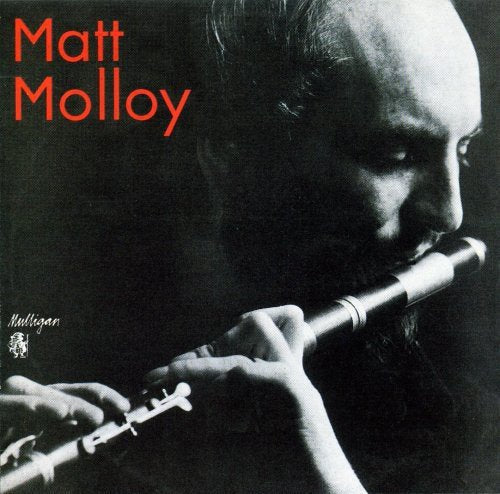 Matt Molloy album cover featuring a man playing a wooden flute.