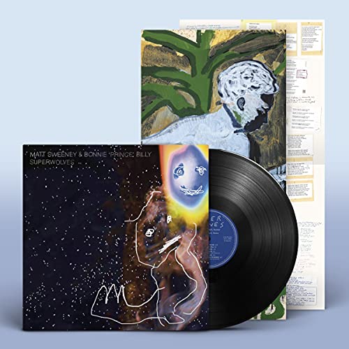 Vinyl record and cover with abstract art of a person and a starry background.