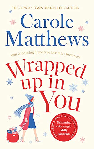 Book cover: woman with red suitcase walking, festive snowflakes, title "Wrapped Up In You".