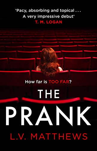 Book cover: Woman with red hair sits alone in a dark theater.