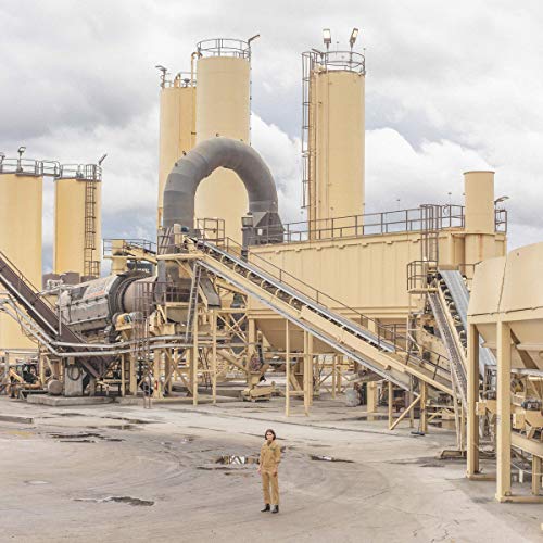 Album cover for Mattiel's "Satis Factory" featuring a woman near industrial silos.