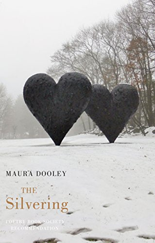 Book cover: two dark heart sculptures in a snowy landscape.