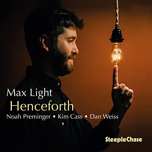 CD cover: Man with beard points at glowing lightbulb.