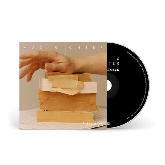CD case for Max Richter’s “In A Landscape” with stacked paper layers.