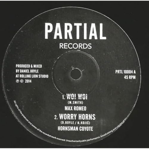 Black vinyl record label with white text: "Max Romeo - Woi Woi".