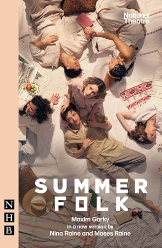 Overhead view of six people lying on white fabric with objects scattered around.