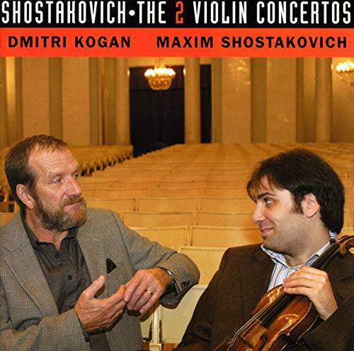 CD cover featuring two men and a concert hall interior.